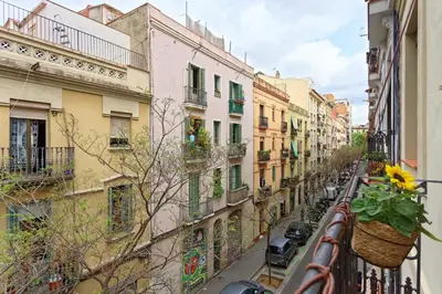 a view of a city street from a balcony at CENTRAL & BRIGHT APARTMENT!! in Barcelona