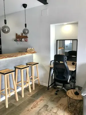an office with a desk and a chair and stool at Les Terrasses de la Cisa, 20kms de BCN in Premia de Dalt