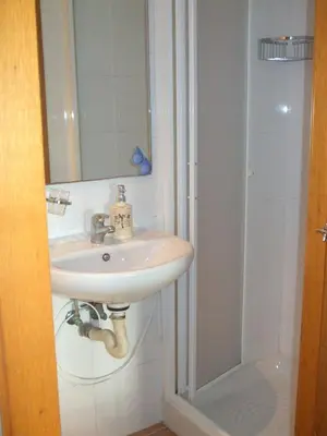 a bathroom with a sink and a shower at Hostal Felipe 2 in Barcelona