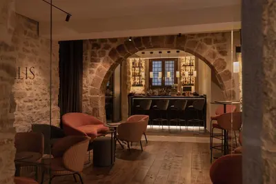 a sign that says kitzilli hospital bar at Gran Hotel Barcino 4 Estrellas SUPERIOR in Barcelona