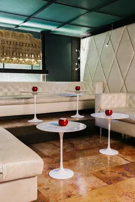 a living room with two tables and a couch at Hotel Granados 83, a member of Preferred Hotels & Resorts in Barcelona