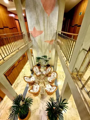 an overhead view of a room with a table in a building at Flor Parks in Barcelona