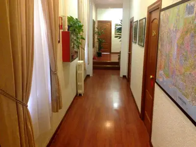 a corridor of a hallway with at Hotel Pelayo in Barcelona