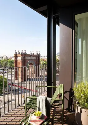 a living room with a couch and a table at Archie Living in Barcelona