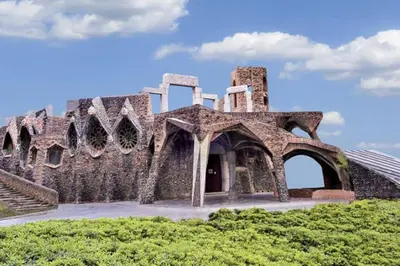 an old building on top of a hill at Precioso Piso Barcelona in Santa Coloma de Cervelló