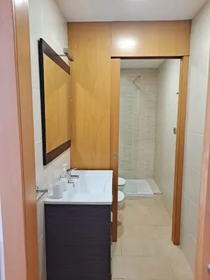 a bathroom with a sink and a toilet at Precioso loft al lado Parc Vallparadís by Lofties in Terrassa