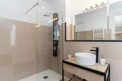 a bathroom with a sink and a shower at SibsBcn-Paseo de Gracia Penthouse-Luxury-Terraces in Barcelona
