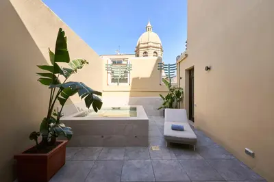 a balcony with a bench and a building at Catalonia Ramblas 4* Sup in Barcelona