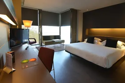 a group of people walking through a window at Hotel Soho in Barcelona