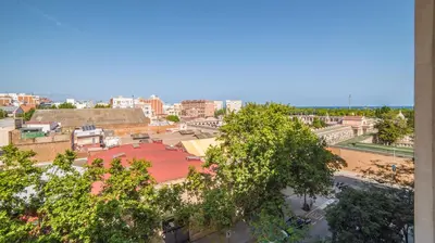 a view of a city with buildings and trees at Welcomy Poblenou in Barcelona