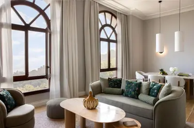 a living room with a couch and a table at METT Barcelona GL - A Leading Hotel of the World in Barcelona