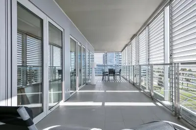 an empty hallway in a building with windows at Alcam Llum Deluxe in Barcelona