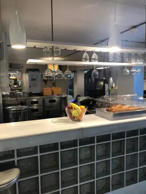 a kitchen with a counter with a bowl of fruit at Colors in Barcelona