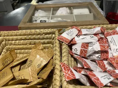 a group of baskets filled with ties on a table at Colors in Barcelona