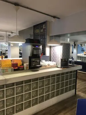 a kitchen with a counter with some food on it at Colors in Barcelona