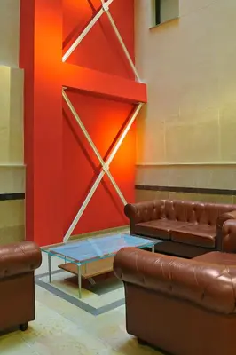 a room with two leather couches and a table at Barcelona Apartment Aramunt in Barcelona