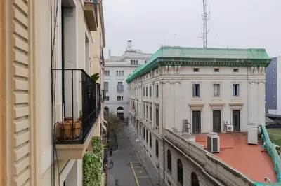a view of a city street from a balcony at Hotel Lyon in Barcelona
