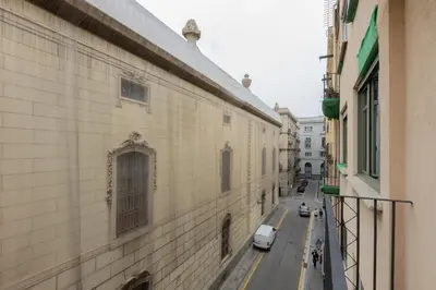 a view of a city street from a building at Hotel Lyon in Barcelona