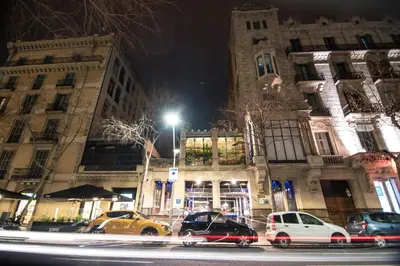 a group of cars parked in front of a building at Petit Palace Museum in Barcelona