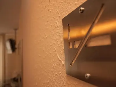 a close up of a metal switch on a wall at Galeón in Sitges