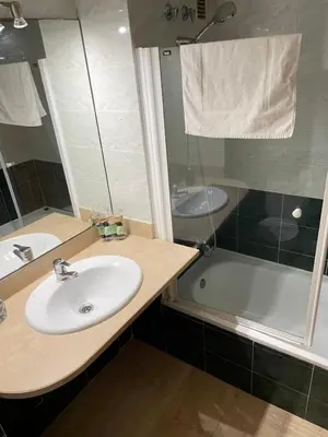 a bathroom with a sink and a shower and a tub at NEW! Amazing 2 bedroom apartment in Rambla del Poblenou in Barcelona