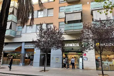 a group of people walking in front of a building at NEW! Amazing 2 bedroom apartment in Rambla del Poblenou in Barcelona