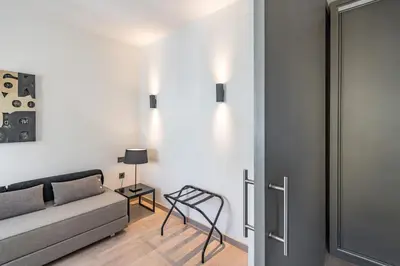 a living room with a couch and a table at Hotel Paseo de Gracia in Barcelona