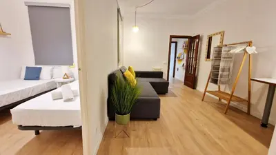 a living room with a couch and a living room at Barcelona4Seasons - Sagrada Familia in Barcelona