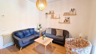 a living room with two couches and a table at Barcelona4Seasons - Sagrada Familia in Barcelona