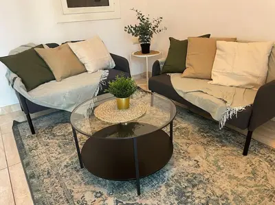 a living room with a couch and a coffee table at Paseo de gracia gran vía de les corts catalanes in Barcelona