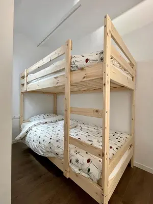 a bunk bed in a room with a bunk beduteneway at loft en el centro in Vilanova i la Geltrú