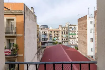 a view of a city from a balcony at Barnapartments Raval in Barcelona