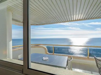 a view of the ocean from the balcony of a cruise ship at Ocean Skyline Penthouse by Hello Homes Sitges in Sitges