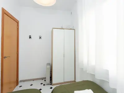 a dressing room with a mirror and a mirror at Click&Flat Fira Castelao in Hospitalet de Llobregat