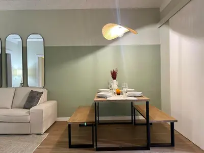a bathroom with a white toilet and a window at The Collection Barcelona - Plaza Catalunya Recently renovated 5BD-4BTH in Barcelona