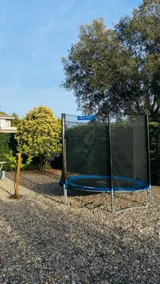 a trampoline with a net on the ground at Villa Òdena in Odena