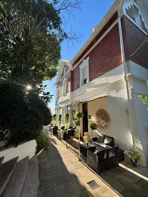 a building with couches on the side of a street at Spirit of Queen experience in Barcelona