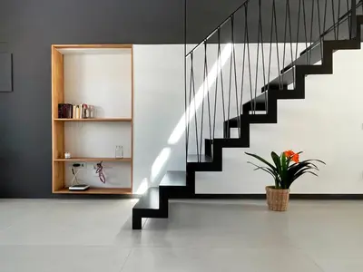a staircase in a house with a potted plant at villa en el penedès in Gornal