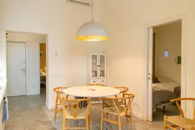 a kitchen and dining room with a table and chairs at 