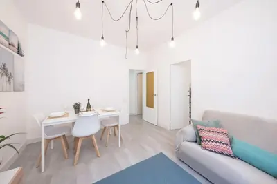 a living room with a couch and a table at Llorens Sagrada Familia in Barcelona