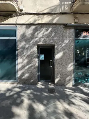 a door on a building with a window at Stay U-nique Apartments Torre Damians in Barcelona