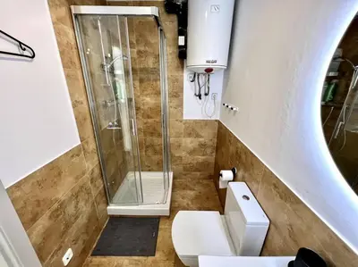 a bathroom with a shower and a toilet at Loft moderno en buena ubicación in Terrassa