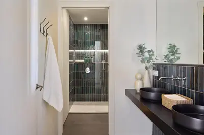 a bathroom with a sink and a shower at Factory Apartments Barcelona in Barcelona