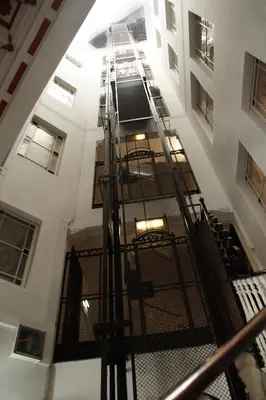 an overhead view of a staircase in a building at Casa Boutique Barcelona in Barcelona
