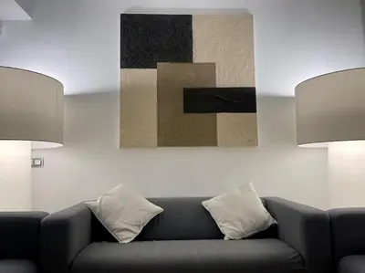 a living room with a couch and two lamps at Exclusiva Villa de Lujo con piscina in Canyelles