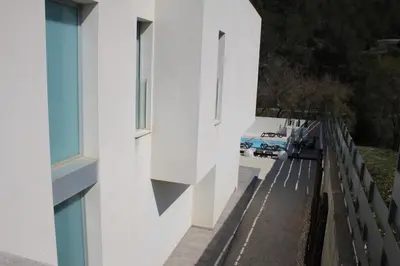 a view from the side of a white building at Exclusiva Villa de Lujo con piscina in Canyelles