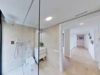 a bathroom with a shower and a sink at Premium Habitat 3 Hermanas in Sant Andreu de Llavaneres