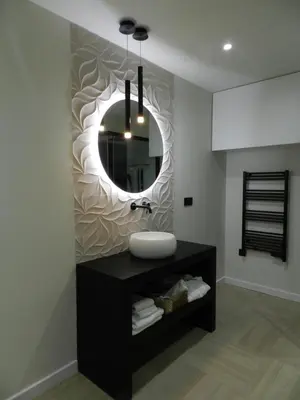 a bathroom with a sink and a mirror on a wall at HOTEL MANEL in Martorell