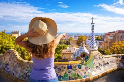 a woman in a hat looking at the eiffel tower at Catalunya Casas Elegant Mountain Villa just 30km to Barcelona in Corbera de Llobregat