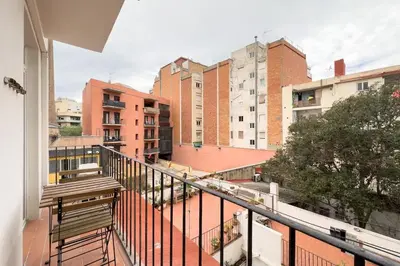 an apartment balcony with a view of buildings at BeBarceloner Sants Apartments - 2 bedrooms in Barcelona
